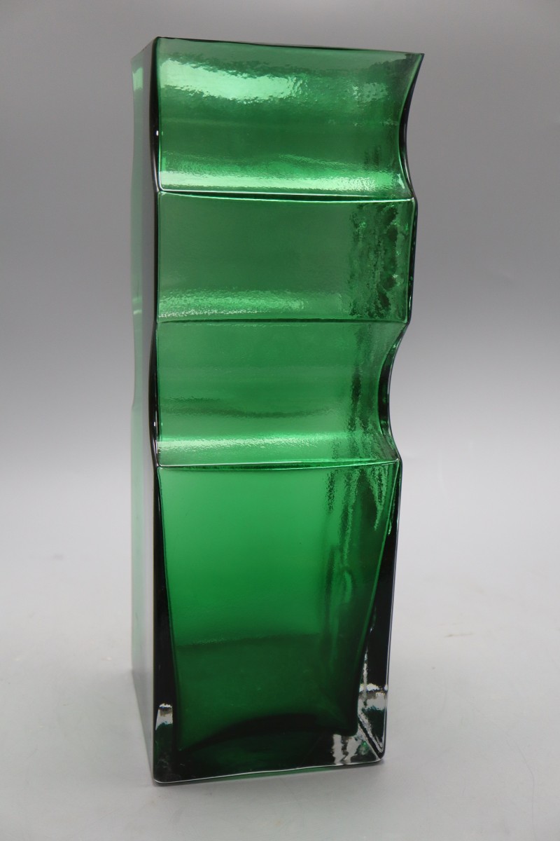 A green glass Dartington sunflower vase, height 39cm